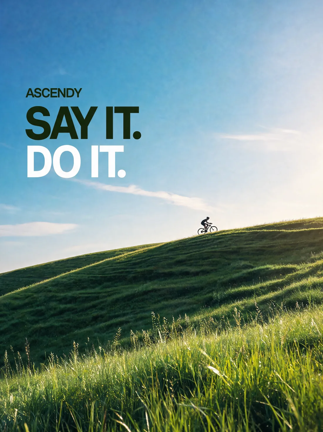 Project poster — “ASCENDY: Say it. Do it.” A lone cyclist cresting a sunlit green ridge under an open blue sky.